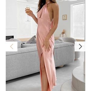 Brand new bridesmaid dress, never worn. Still has the tags on it